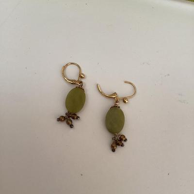 Warm toned necklace and earring set. Green stone