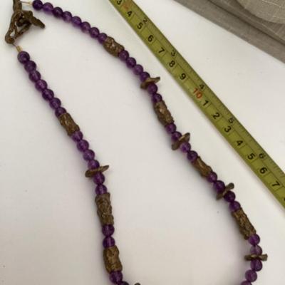Purple and gold tone beaded necklace