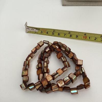 3 strands brown beaded stretch bracelets