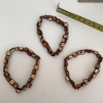 3 strands brown beaded stretch bracelets
