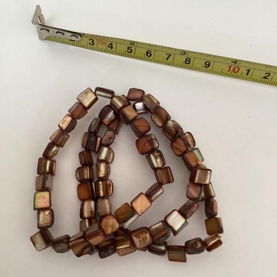 3 strands brown beaded stretch bracelets