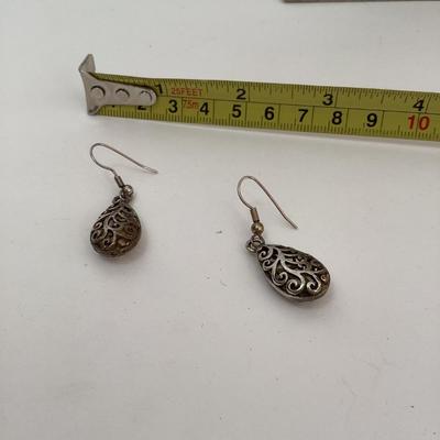 Silver toned filagree teardrop earrings