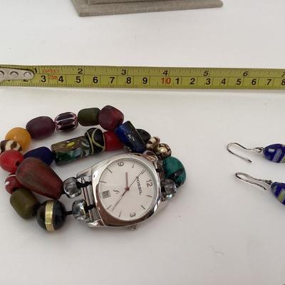Fossil women’s wrist watch and blue floral earrings