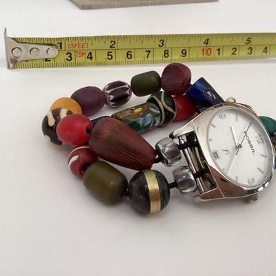Fossil women’s wrist watch and blue floral earrings
