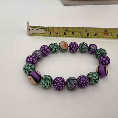 Green and purple Multicolor beaded stretch bracelet