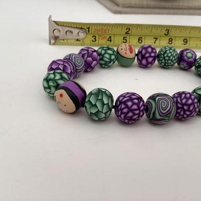 Green and purple Multicolor beaded stretch bracelet