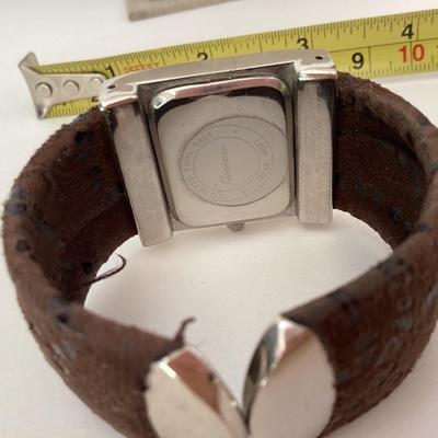 Geneva brown and silver tone watch