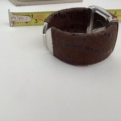 Geneva brown and silver tone watch