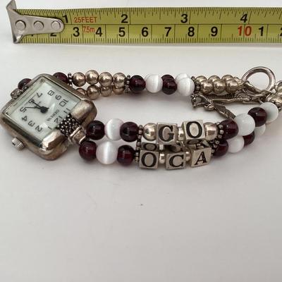 Geneva brown and silver tone watch “Go OCA”