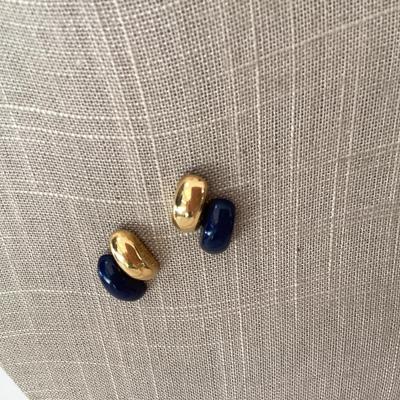 Dark blue and gold tone earrings