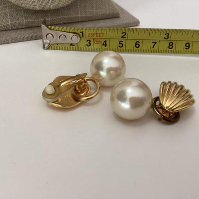Gold tone large pearl like clip on earrings