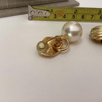 Gold tone large pearl like clip on earrings
