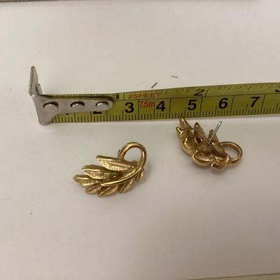 Gold tone leaf earrings