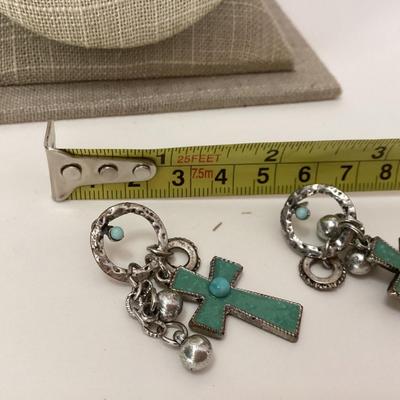 Turquoise colored cross earrings