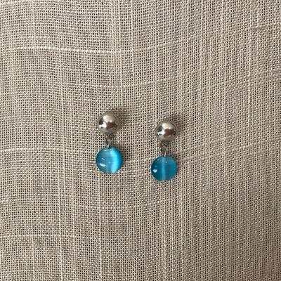 light blue and silver toned earrings