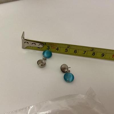 light blue and silver toned earrings