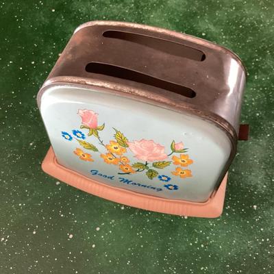 vintage toy toaster with flower detail