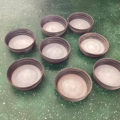 Mason jar lids with porcelain inserts