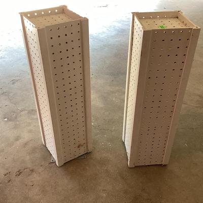 Peg board spinning displays