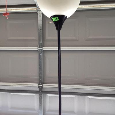 6 ft tall simple white and black lamp with 10 inch plastic shade