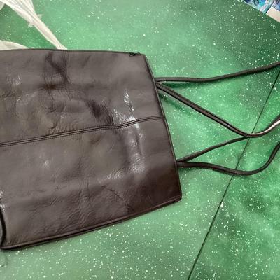 black long leather bag with magnetic snap close