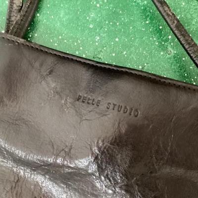 black long leather bag with magnetic snap close