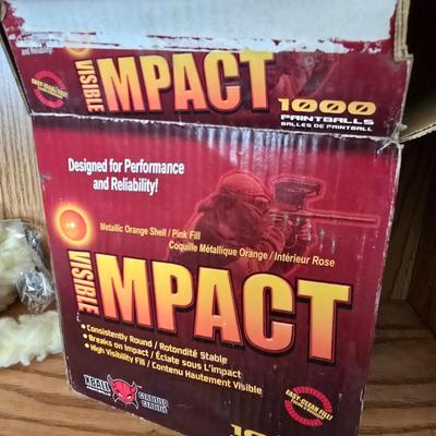 Impact Paintballs- 1000 count and a bottle of Round one hand cleaner