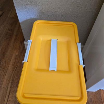 small lidded totes - and a small laundry or storage basket