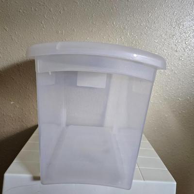 small lidded totes - and a small laundry or storage basket