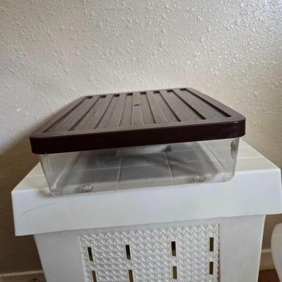 small lidded totes - and a small laundry or storage basket