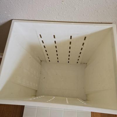 small lidded totes - and a small laundry or storage basket