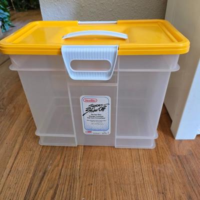 small lidded totes - and a small laundry or storage basket