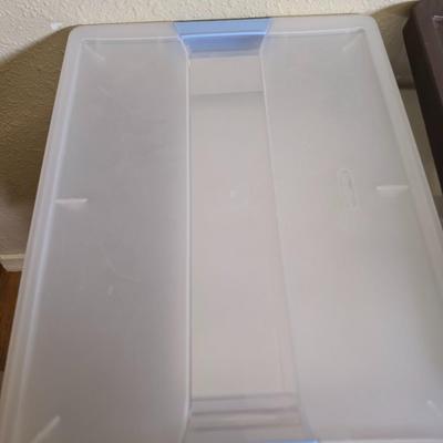 small lidded totes - and a small laundry or storage basket