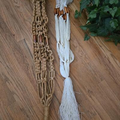 Two Faux plants with two macramé plant hangers