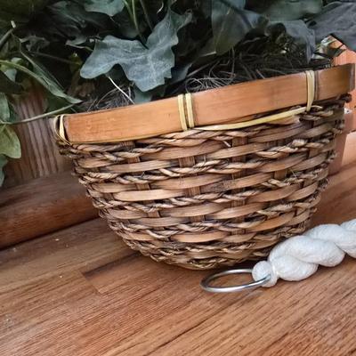Two Faux plants with two macramé plant hangers