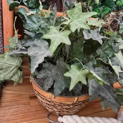 Two Faux plants with two macramé plant hangers
