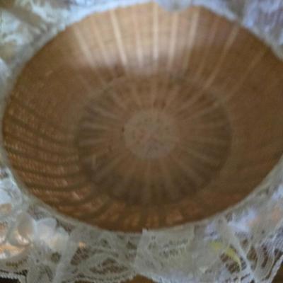 Large lot of wicker baskets, a faux plant, wall art and more
