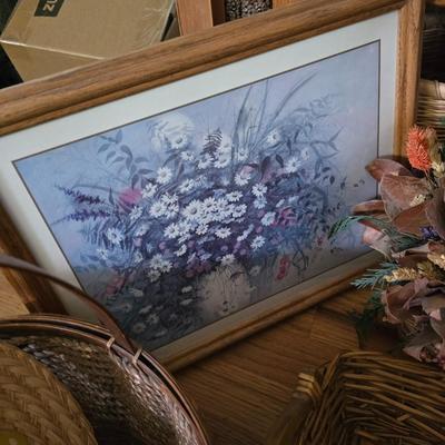 Large lot of wicker baskets, a faux plant, wall art and more