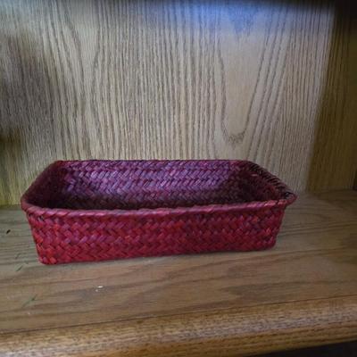 Large lot of wicker baskets, a faux plant, wall art and more