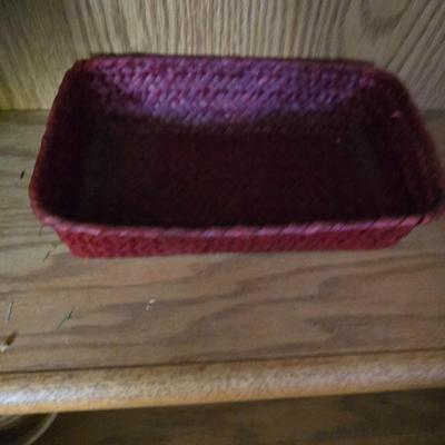 Large lot of wicker baskets, a faux plant, wall art and more