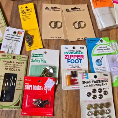 New old stock sewing notions - old needles with neat graphics -zippers - buttons- Vintage 1948 Singer Buttonholer and more