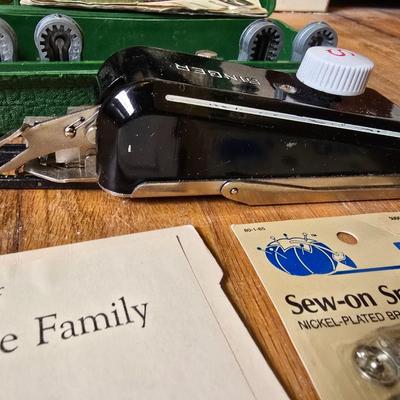 New old stock sewing notions - old needles with neat graphics -zippers - buttons- Vintage 1948 Singer Buttonholer and more