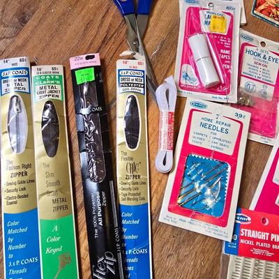 New old stock sewing notions - old needles with neat graphics -zippers - buttons- Vintage 1948 Singer Buttonholer and more