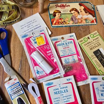 New old stock sewing notions - old needles with neat graphics -zippers - buttons- Vintage 1948 Singer Buttonholer and more
