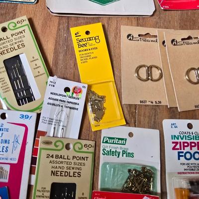 New old stock sewing notions - old needles with neat graphics -zippers - buttons- Vintage 1948 Singer Buttonholer and more