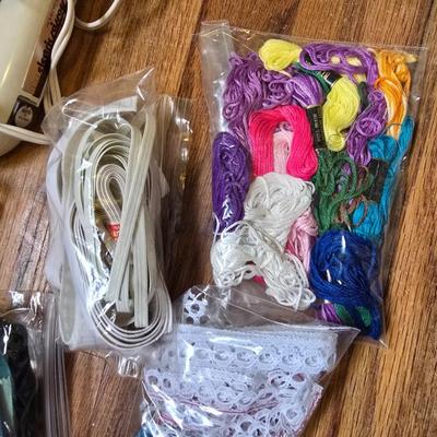 Sewing starter kit - needles - electric scissors - booklets- buttons - thread and much more