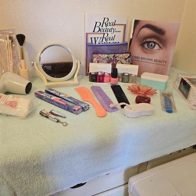 Beauty and makeup books - hair dryer - makeup brush set - nail polishes and more