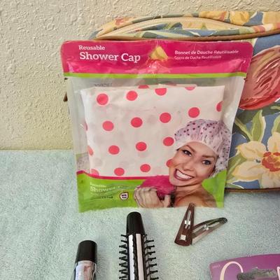 Bathroom scale - curling irons - hairdryer - and an assortment of other beauty products
