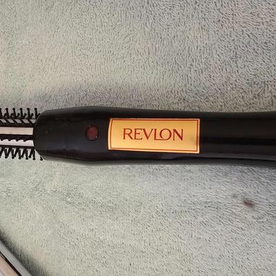 Bathroom scale - curling irons - hairdryer - and an assortment of other beauty products