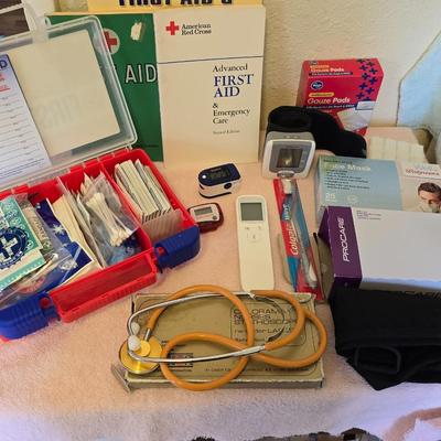 First Aid kit with books - Blood pressure monitor - o2 sensor - thermometer and other health related aides